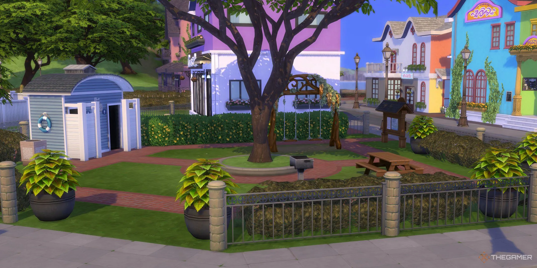 Công viên nhỏ với xích đu, lò nướng và nhà vệ sinh tại Coast of Adhmor, The Sims 4.