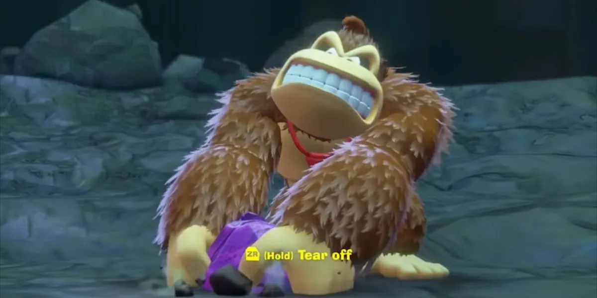 Donkey Kong khéo léo xé một mảng đất từ mặt đất, chuẩn bị sử dụng nó làm công cụ di chuyển hoặc vũ khí.