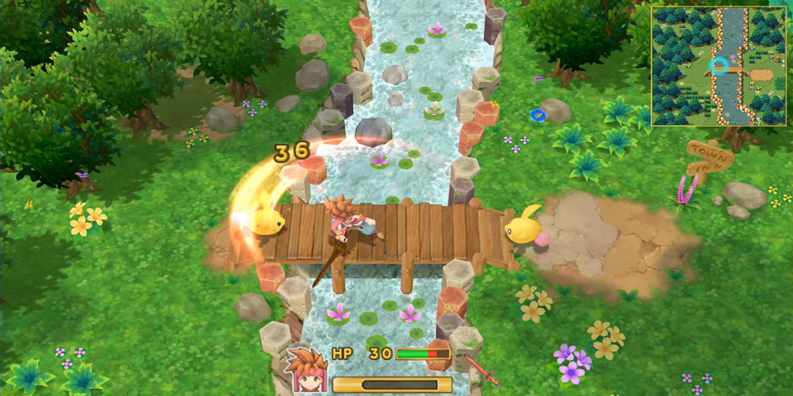 Hiệp sĩ vung kiếm tấn công quái vật trong cảnh chiến đấu của Secret of Mana (2018)