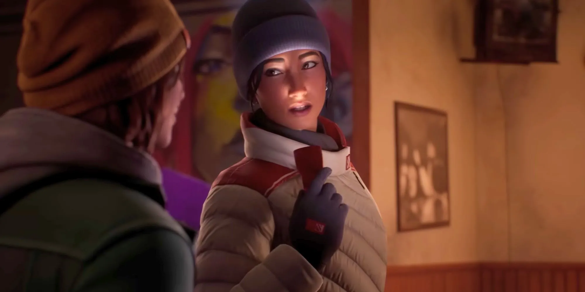 Max Caulfield và Safi trong Life Is Strange: Double Exposure đang trò chuyện tại trường đại học Blackwell, biểu cảm thân thiết của đôi bạn