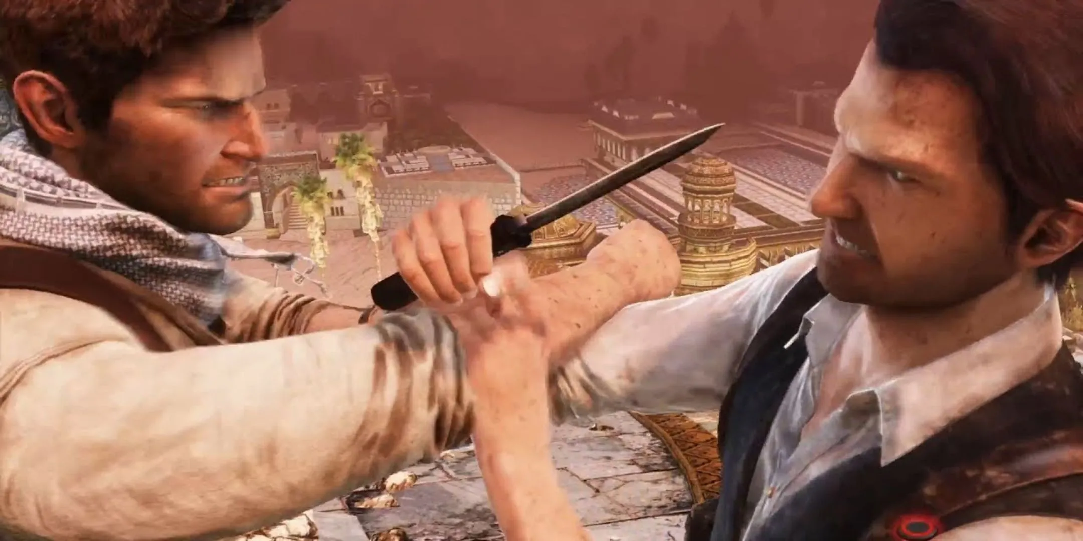 Nathan Drake đấu tay đôi căng thẳng với Talbot giữa cảnh đổ nát trong Uncharted 3: Drake's Deception.