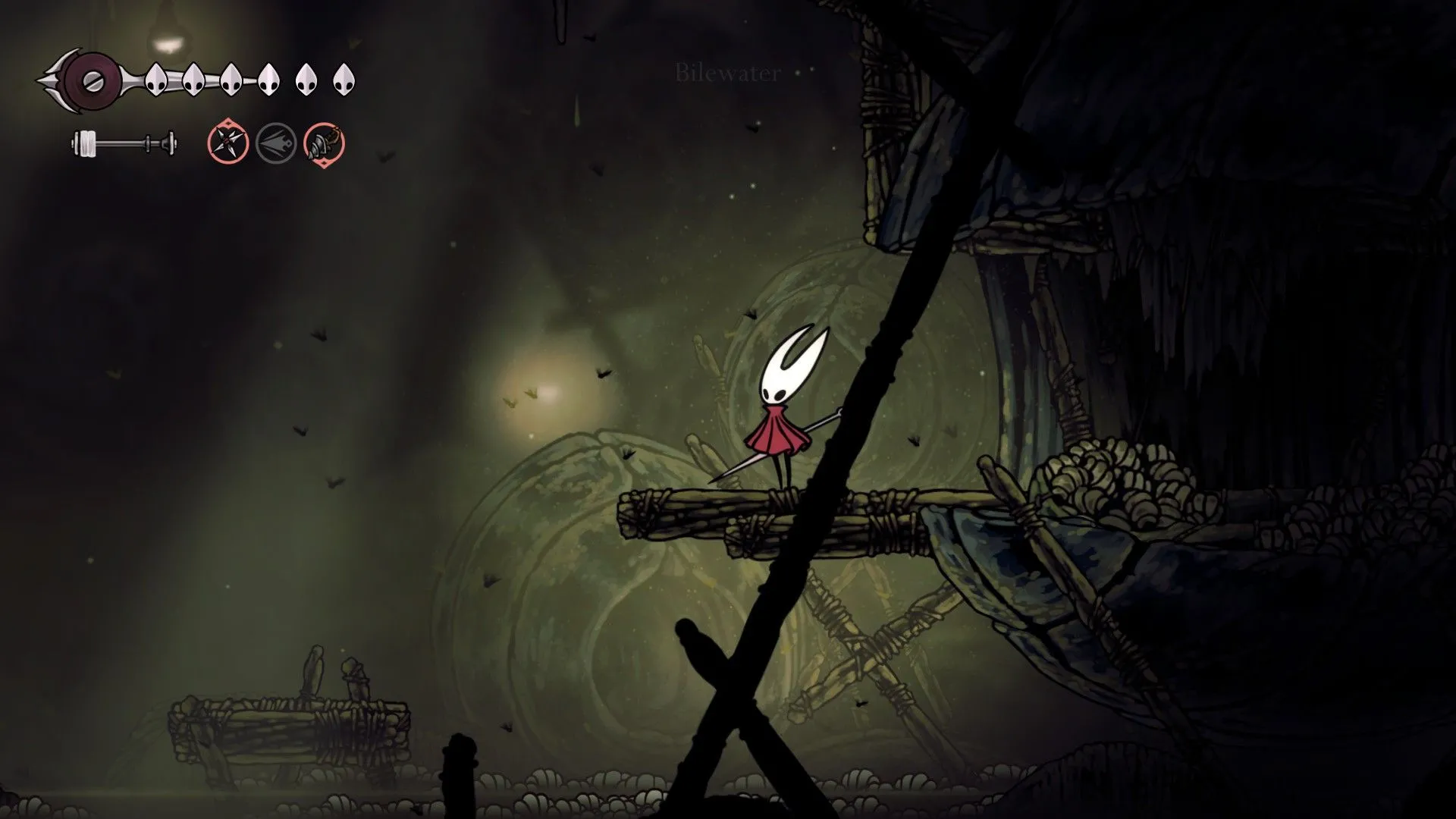 Groal The Great, một nhân vật bí ẩn tại lối vào Bilewater, tạo không khí u ám trong Hollow Knight Silksong