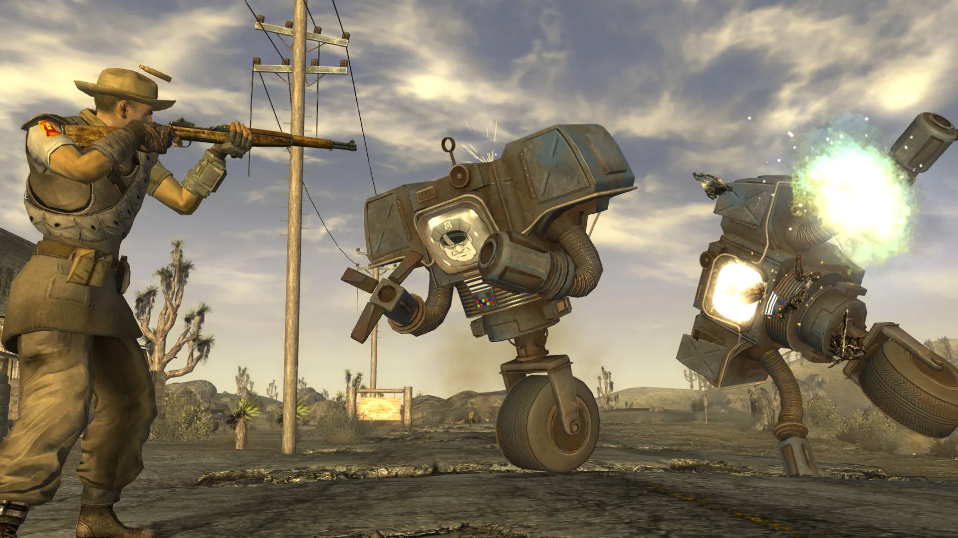 Người chơi trong Fallout: New Vegas chiến đấu với Securitrons giữa cảnh quan hậu tận thế hoang tàn của dải New Vegas